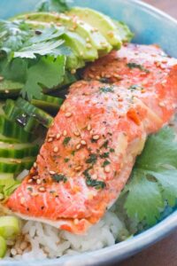 Closeup image of a salmon sushi bowl.
