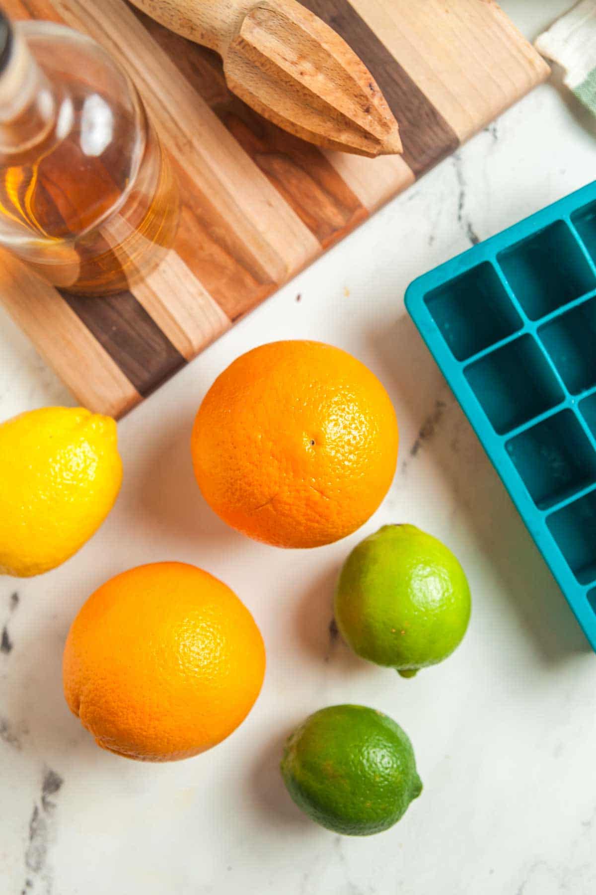 Ingredients needed to make whole fruit margaritas.