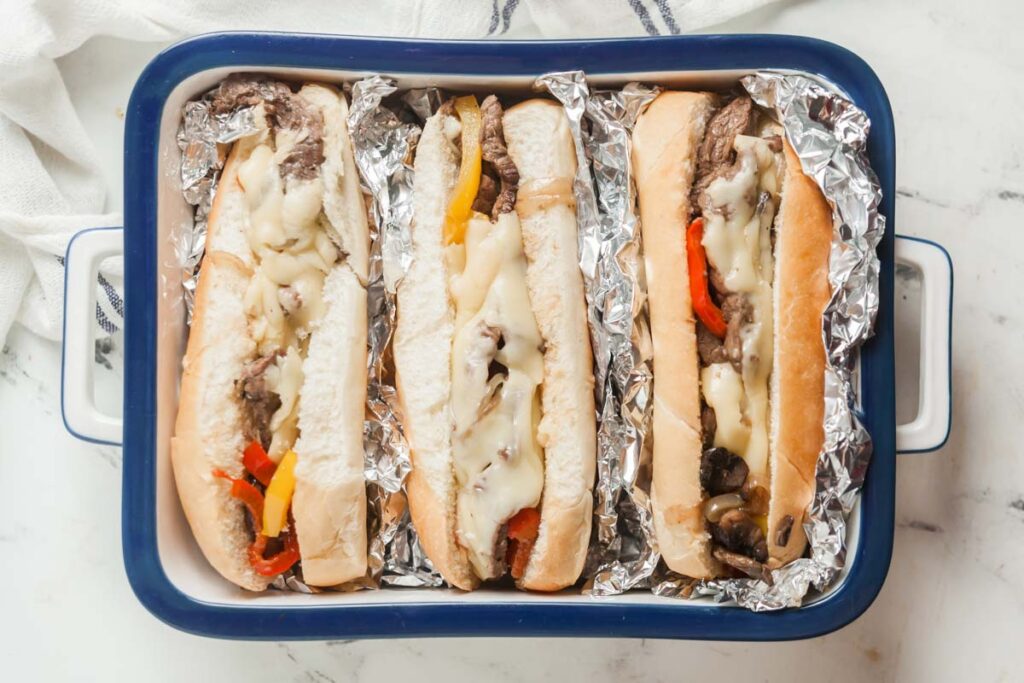 Spicy sheet pan cheesesteaks ready to eat.