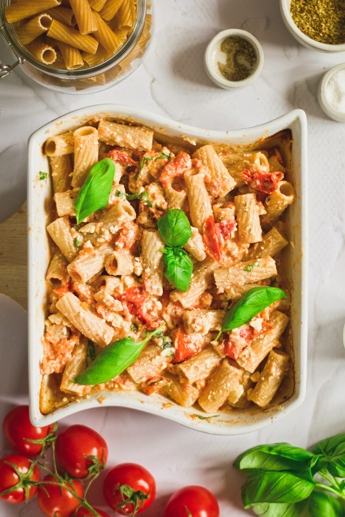 Overhead view of a baking pan filled with feta pasta.