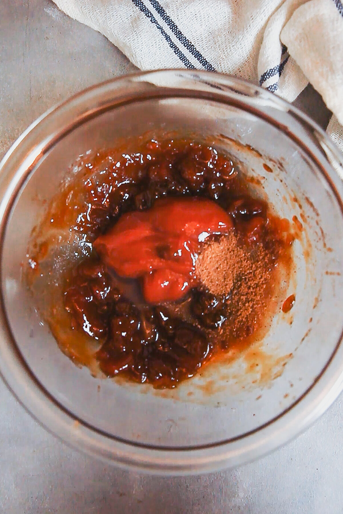 Mixing ingredients for homemade barbecue sauce. 