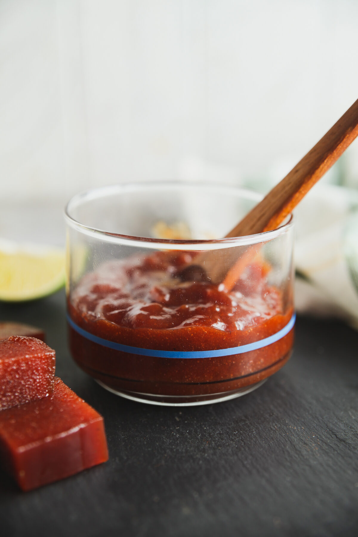 Homemade guava bbq sauce in a glass container.