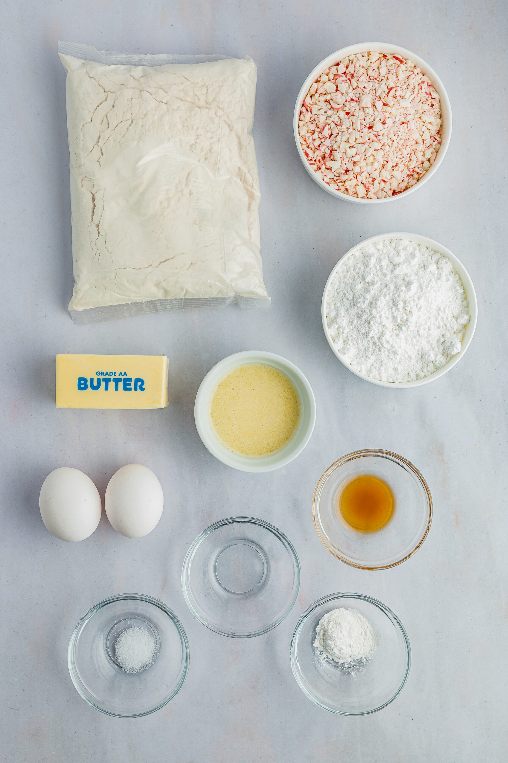 Overhead view of ingredients needed to make cake mix cookies and peppermint buttercream frosting.