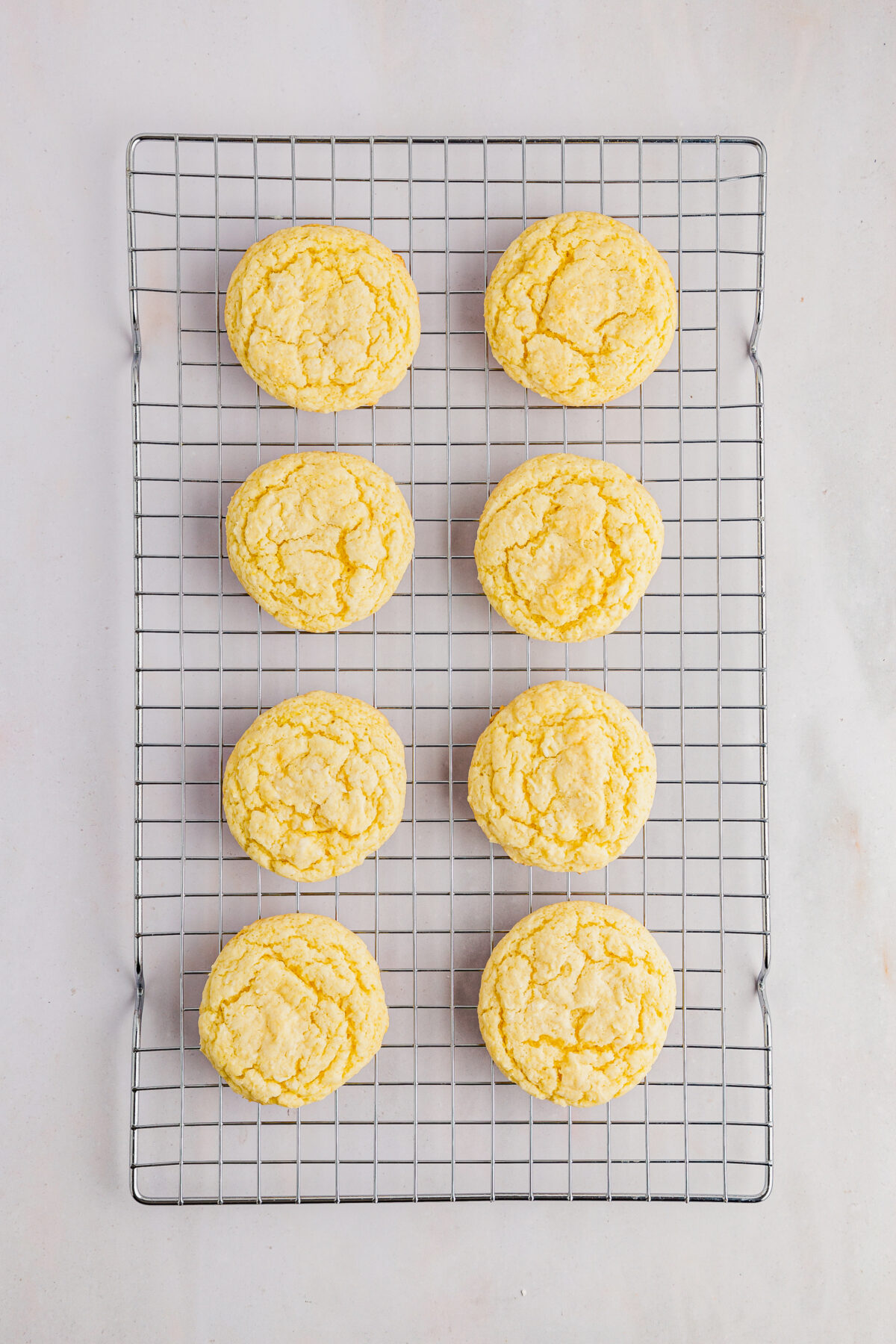 Cool the cookies completely before frosting them.