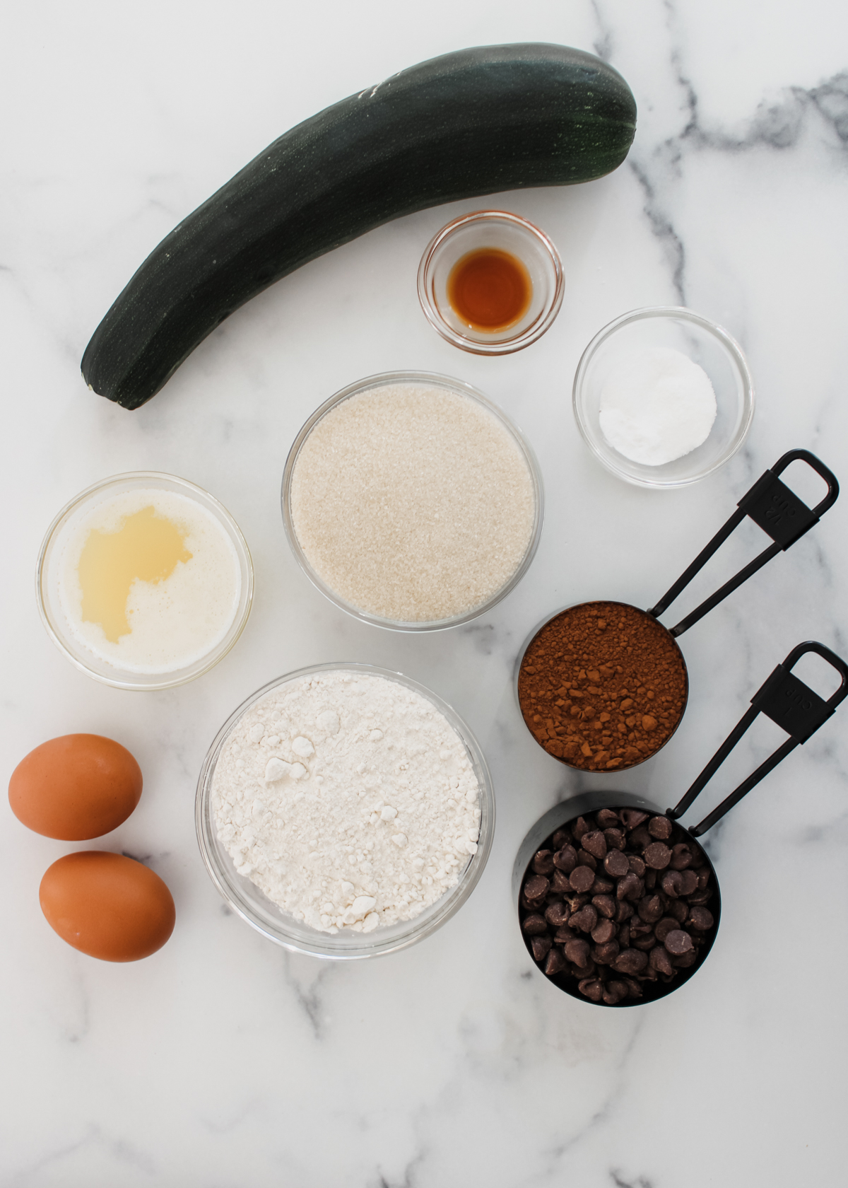 Ingredients needed to make chai and double chocolate zucchini muffins. 