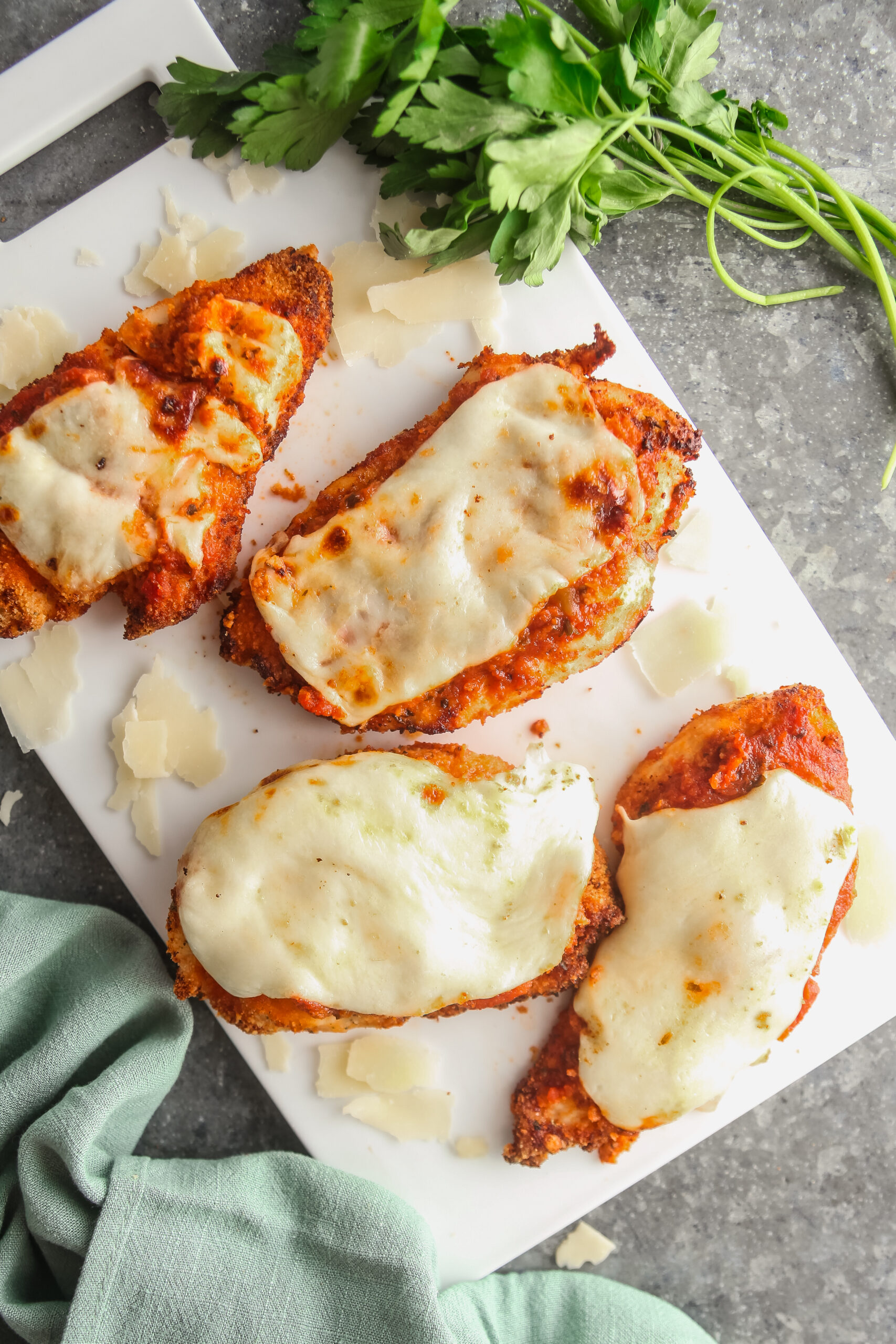 air fryer chicken parmesan with melted mozzarella cheese.