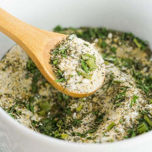 A white bowl filled with homemade buttermilk ranch seasoning.