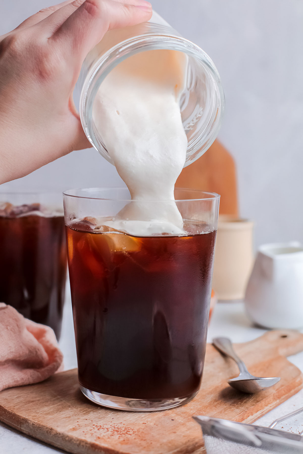 Topping cold brew with Irish Cream foam. 