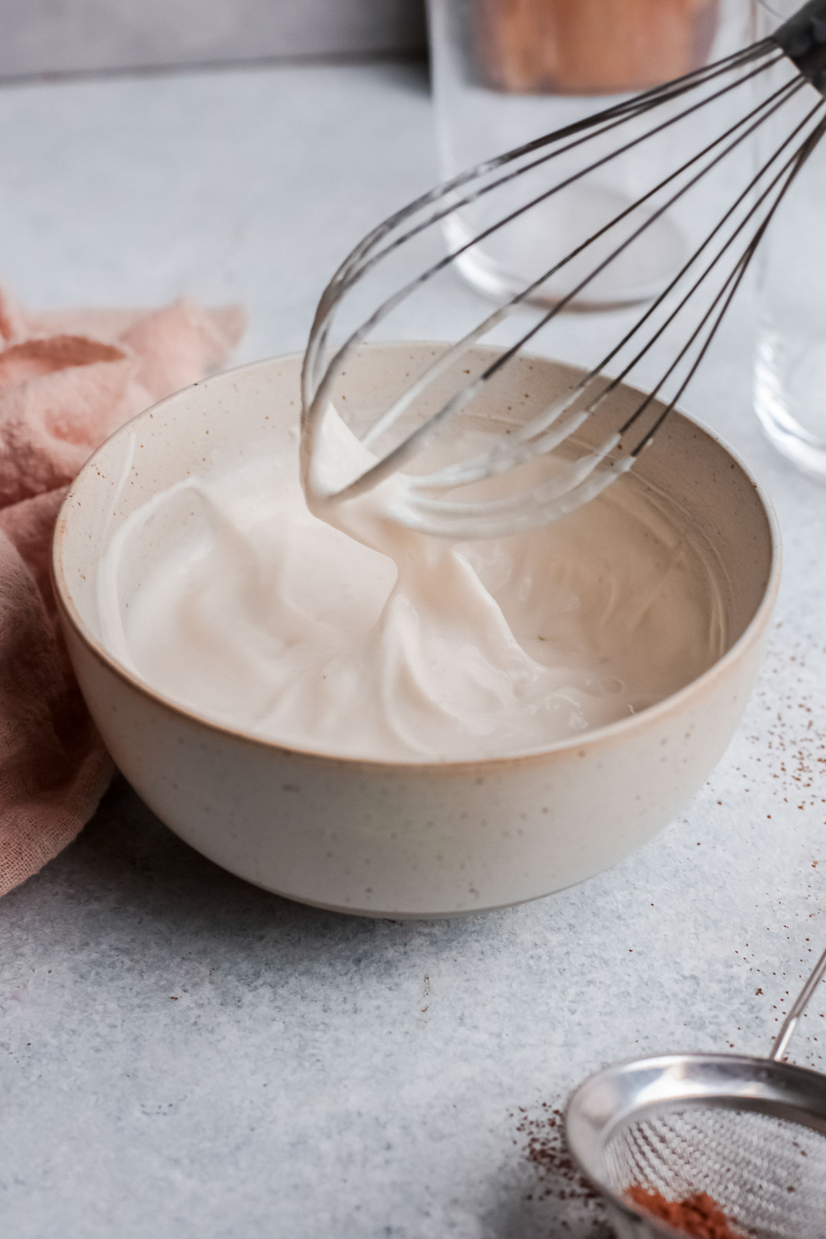 Whisking the ingredients together in a bowl. 