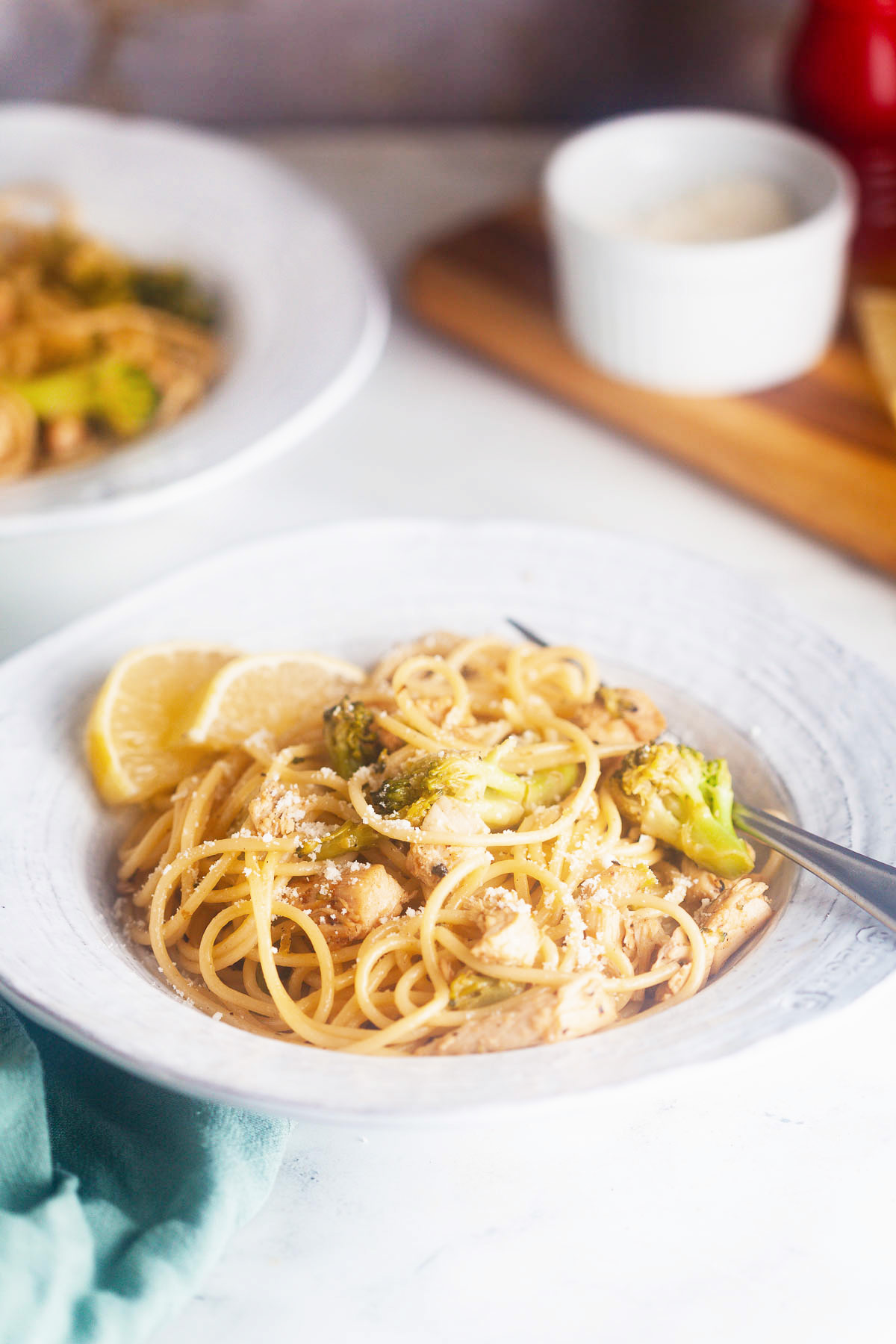 Lemon spaghetti with chicken and broccoli tablescape. 
