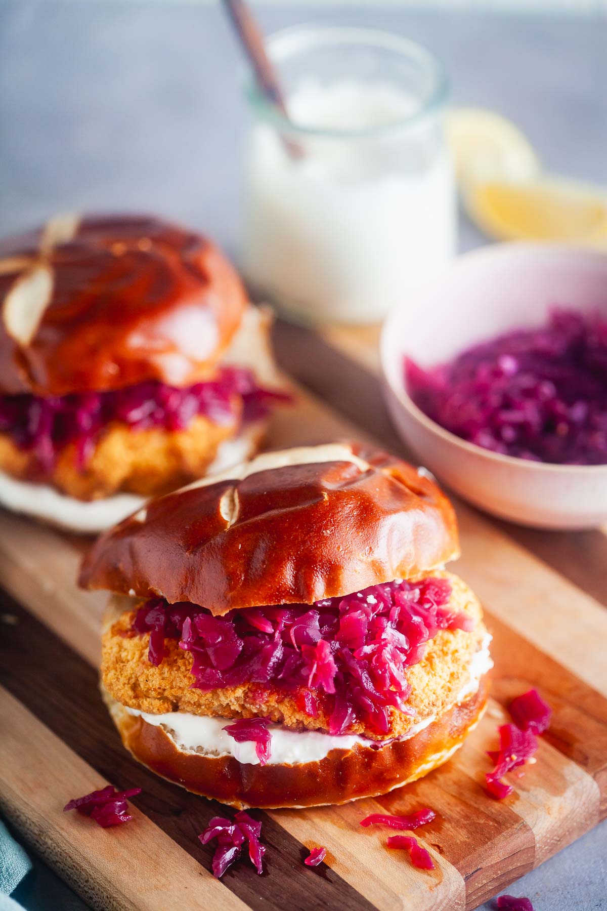 Crispy chicken sandwiches with red cabbage and lemon cream sauce.