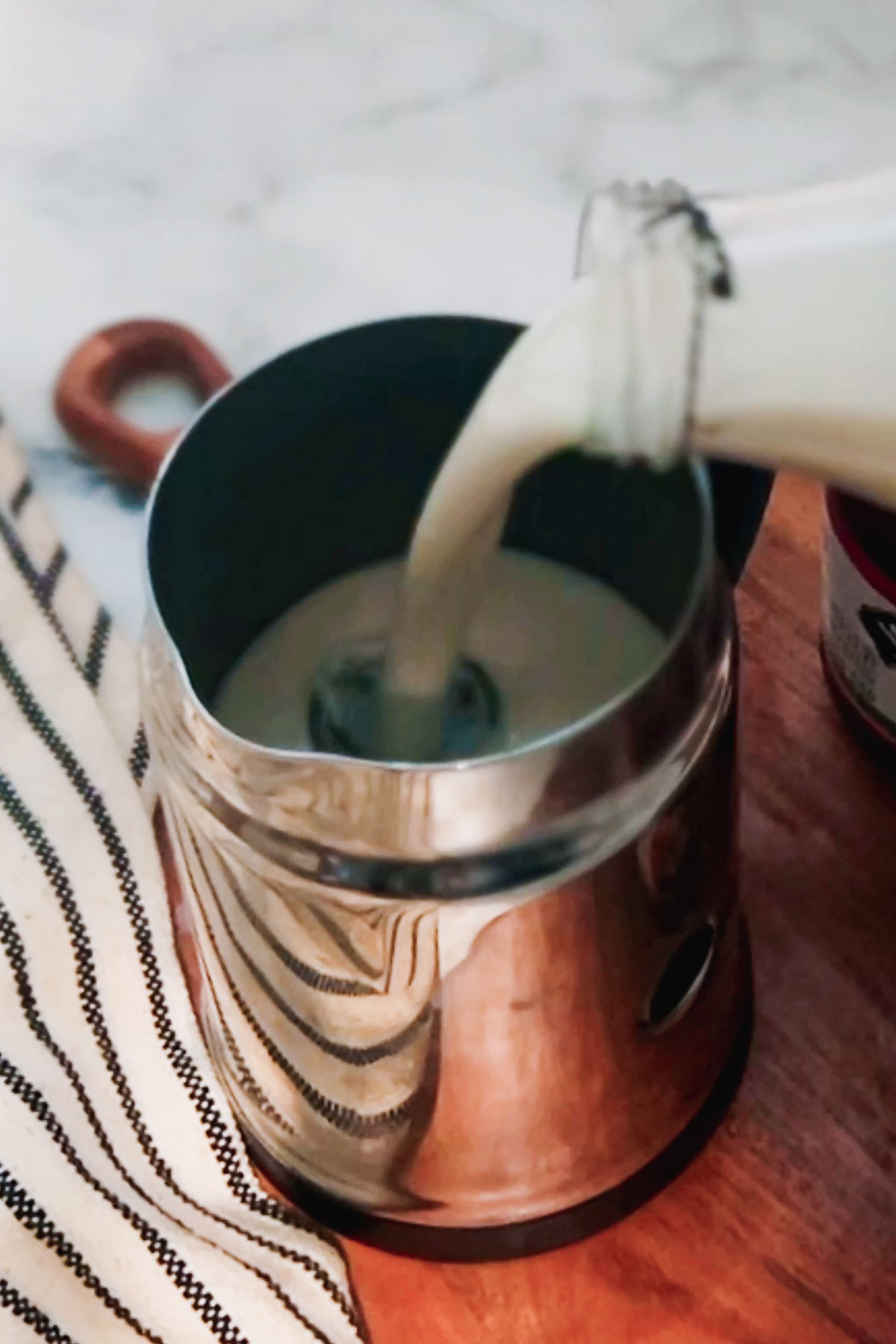 Steaming milk for a latte. 