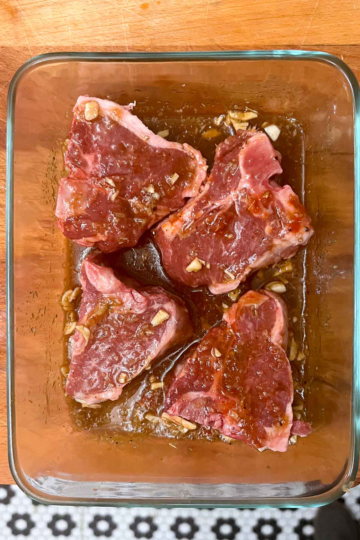 Letting the lamb marinate before putting it in the air fryer.