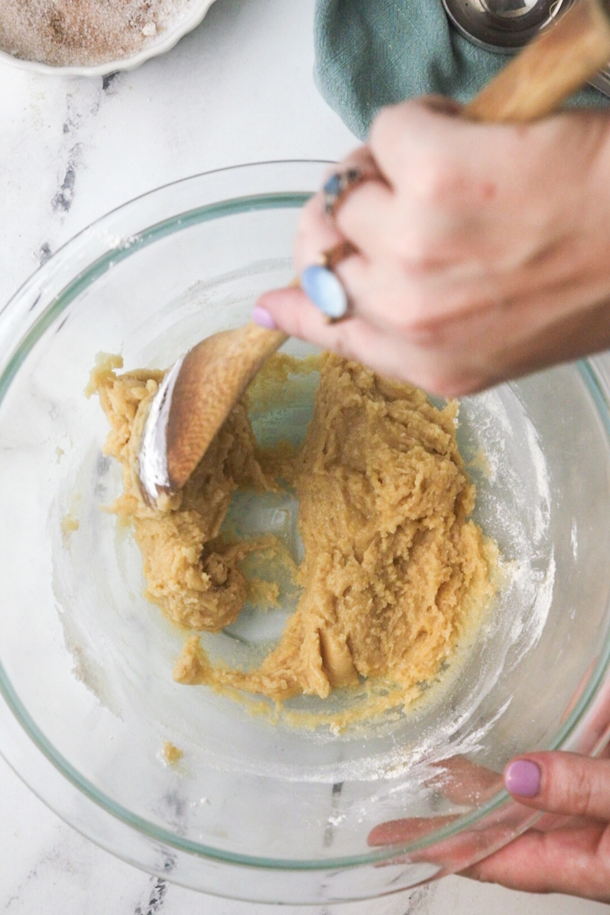 Scooping the cookie dough.