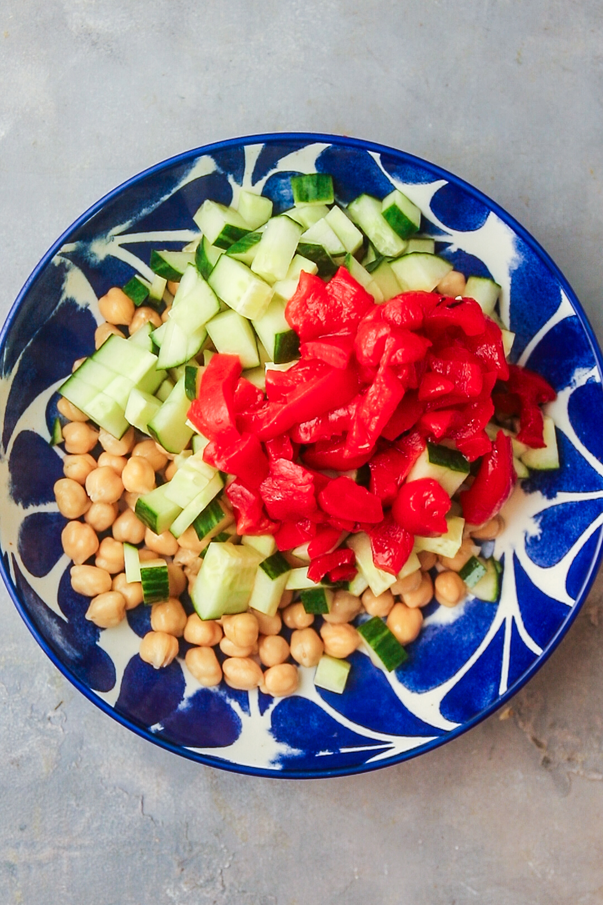 Adding roasted red peppers. 