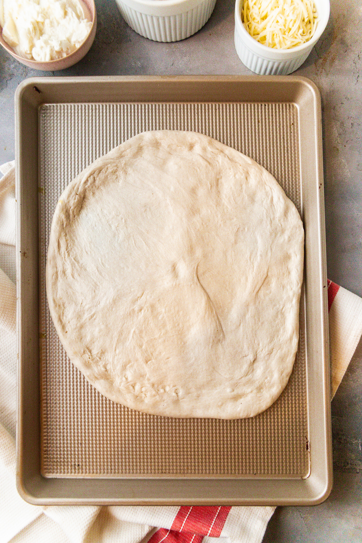 Shaping pizza dough. 