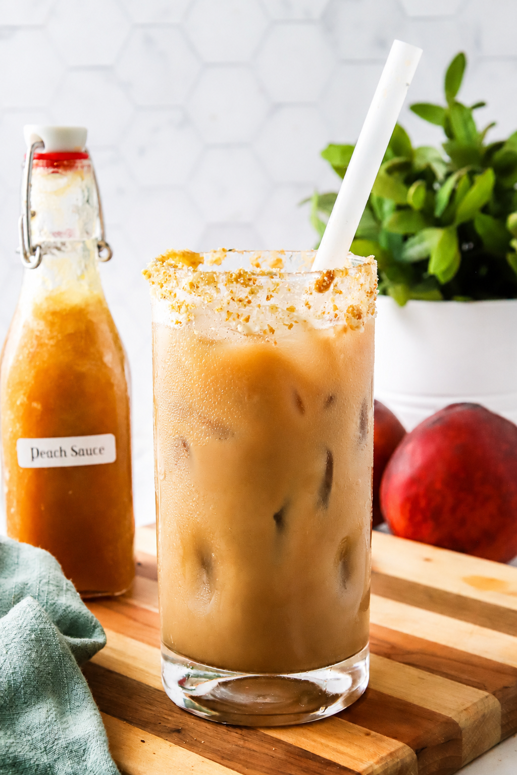 Homemade peach syrup is great for making drinks like this peach cobbler shaken espresso.